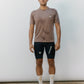 model wearing cycling shirt, casual cycling shirt, cycling bib shorts